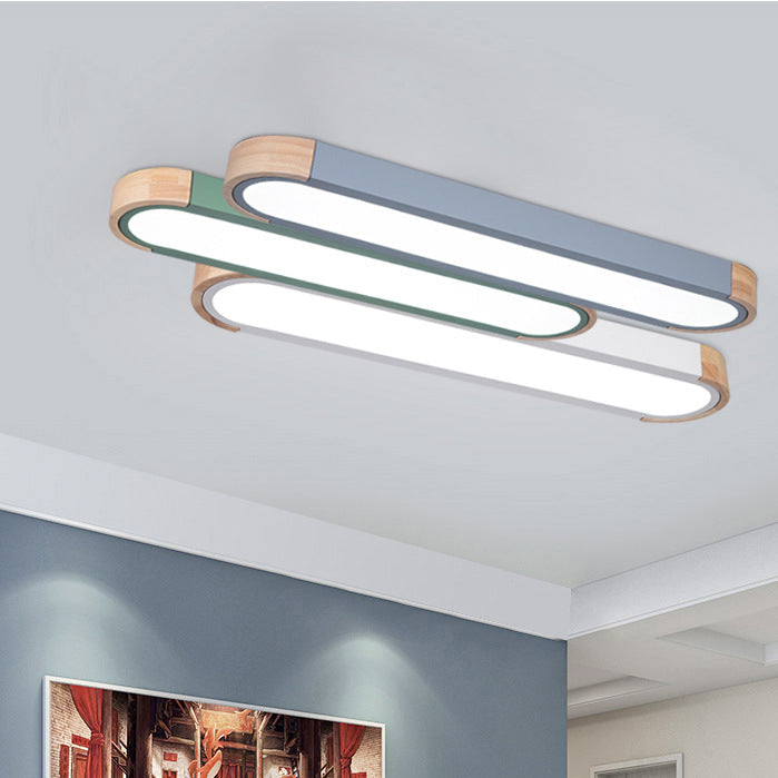 Contemporary Scandinavian Long Oval Iron Log Acrylic LED Flush Mount Ceiling Light For Bedroom Lumendat