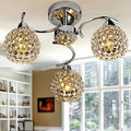 Modern Art Deco Round Hollowed Out Orb Iron Crystal 3-light Semi-flush Mount Ceiling Light for Living Room