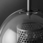 Contemporary Industrial Iron Finish Frame Spherical Glass Shade 1-Light Wall Sconce Lamp For Bedroom Lumendat