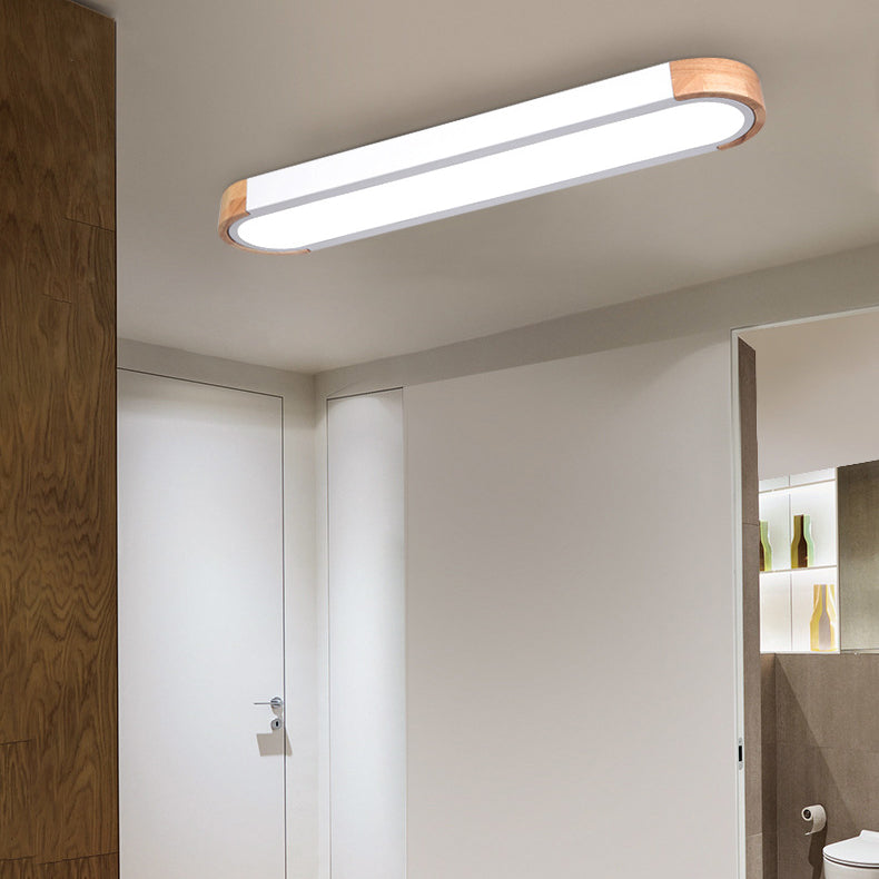 Contemporary Scandinavian Long Oval Iron Log Acrylic LED Flush Mount Ceiling Light For Bedroom Lumendat