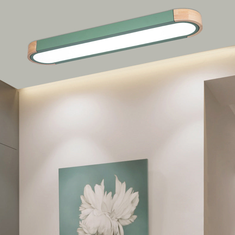 Contemporary Scandinavian Long Oval Iron Log Acrylic LED Flush Mount Ceiling Light For Bedroom Lumendat