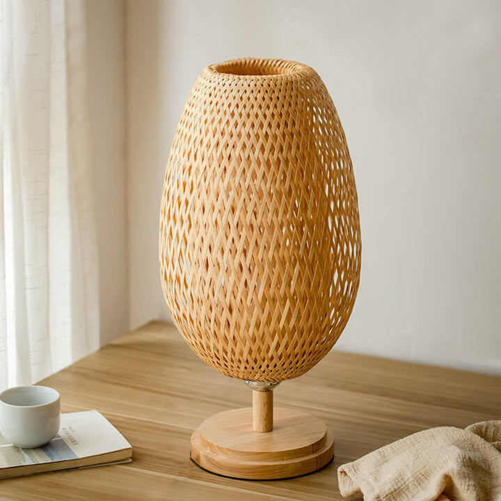 Traditional Chinese Moso Bamboo Wood Iron Weaving Oval Round 1-Light Table Lamp For Bedroom Lumendat