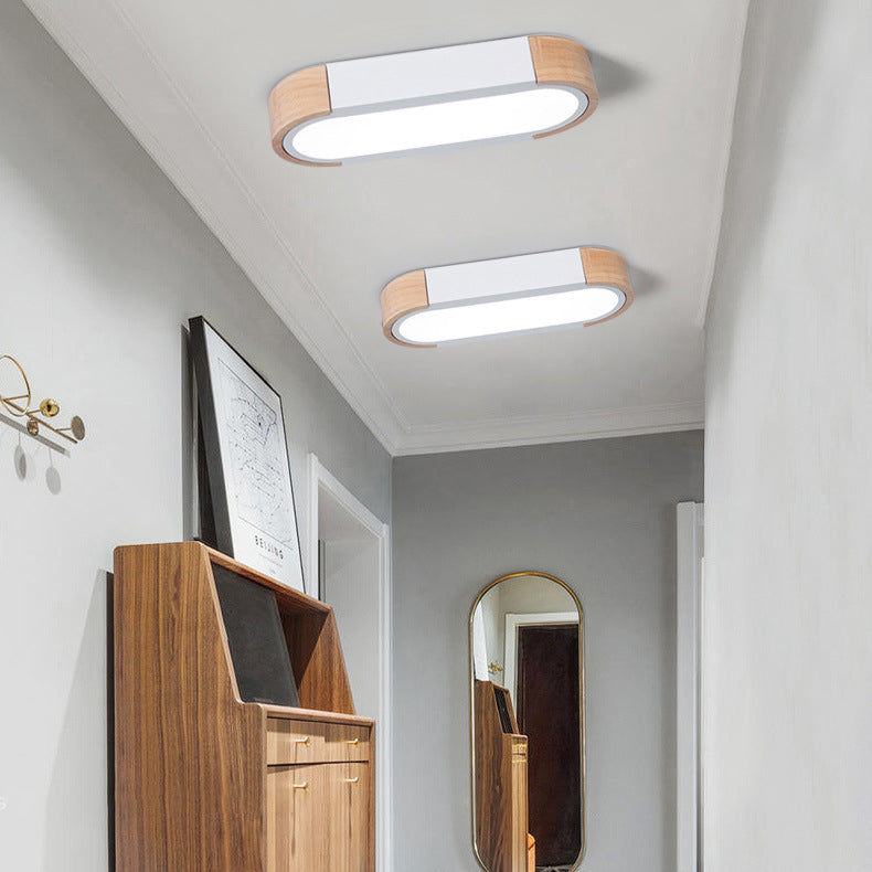 Contemporary Scandinavian Long Oval Iron Log Acrylic LED Flush Mount Ceiling Light For Bedroom Lumendat