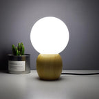 Nordic Solid Wood Milk White Glass Orb 1-Light Table Lamp Lumendat
