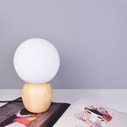 Nordic Solid Wood Milk White Glass Orb 1-Light Table Lamp Lumendat