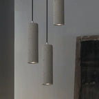 Contemporary Industrial Cylindrical Rough Texture Cement 1-light Pendant Light for Living Room Lumendat