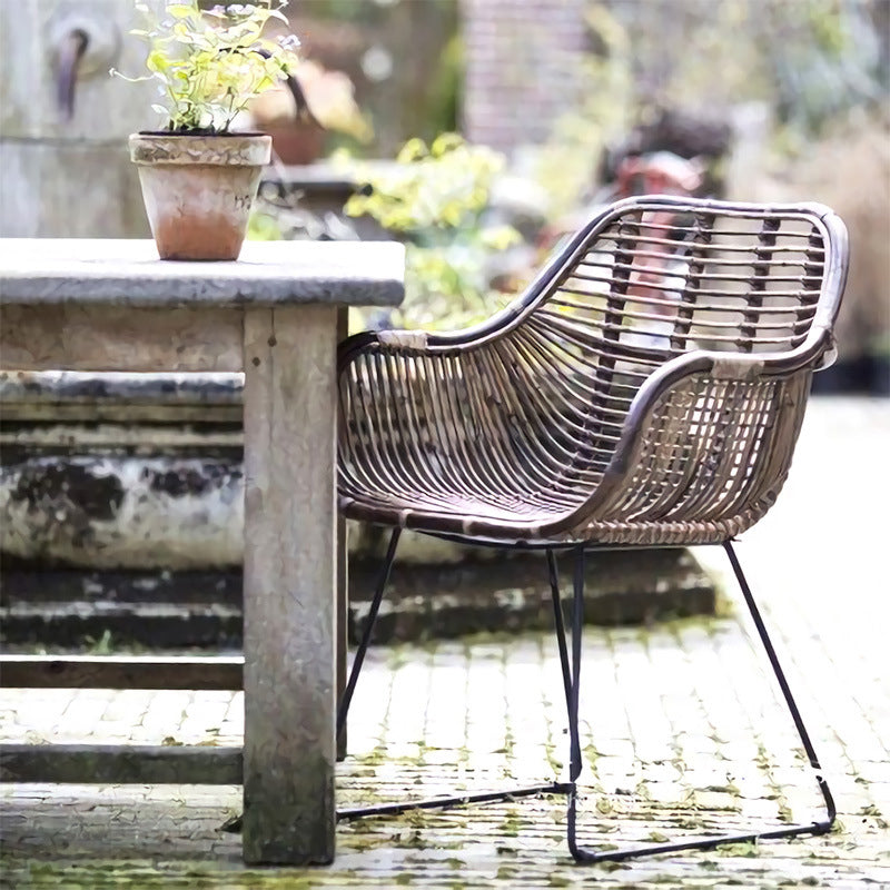 Contemporary Nordic Handwoven Natural Rattan Lounge Chair - Accent Chair With Ergonomic Backrest & Iron Base For Indoor & Outdoor Living Lumendat