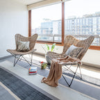 Contemporary Scandinavian Handwoven Rattan Lounge Chair - Accent Chair With Ergonomic Backrest & Iron Base For Boutique Indoor & Outdoor Spaces Lumendat