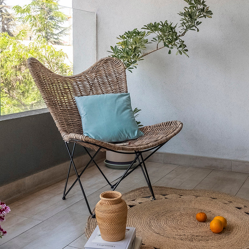 Contemporary Scandinavian Handwoven Rattan Lounge Chair - Accent Chair With Ergonomic Backrest & Iron Base For Boutique Indoor & Outdoor Spaces Lumendat
