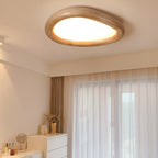 Modern Minimalist Diffuser Panel Resin Iron Pebble-Shaped LED Flush Mount Ceiling Light For Bedroom & Living Room