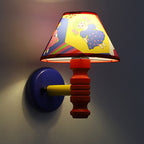 Lumendat Contemporary Scandinavian Art Cartoon Kids Painting Round Table Cylinder Iron Fabric Wood 1-Light Wall Sconce Lamp For Bedroom Lumendat