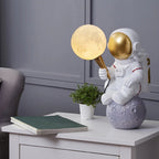 Creative Kids Table Lamp – 1-Light Cartoon Astronaut Resin Lamp for Bedroom Lumendat