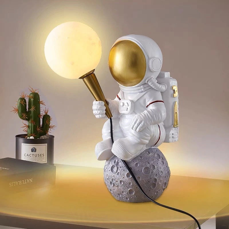 Creative Kids Table Lamp – 1-Light Cartoon Astronaut Resin Lamp for Bedroom Lumendat