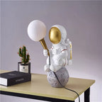 Creative Kids Table Lamp – 1-Light Cartoon Astronaut Resin Lamp for Bedroom Lumendat