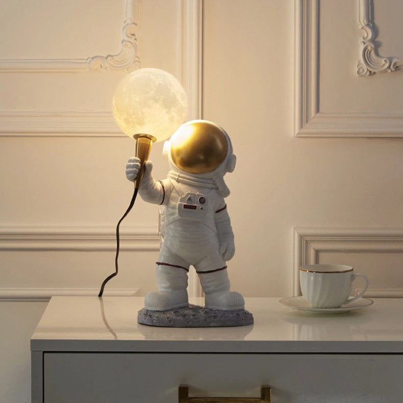 Creative Kids Table Lamp – 1-Light Cartoon Astronaut Resin Lamp for Bedroom Lumendat