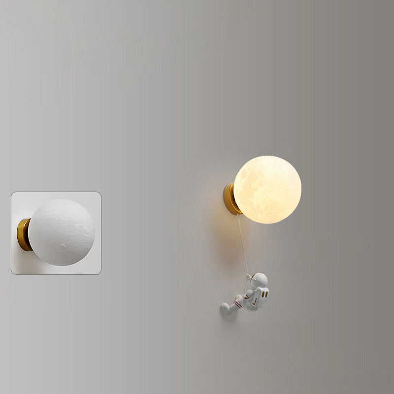 Lumendat Contemporary Nordic Kids Resin Glass Ball Astronaut Lunar Planet 1-Light Wall Sconce Lamp For Bedside Lumendat