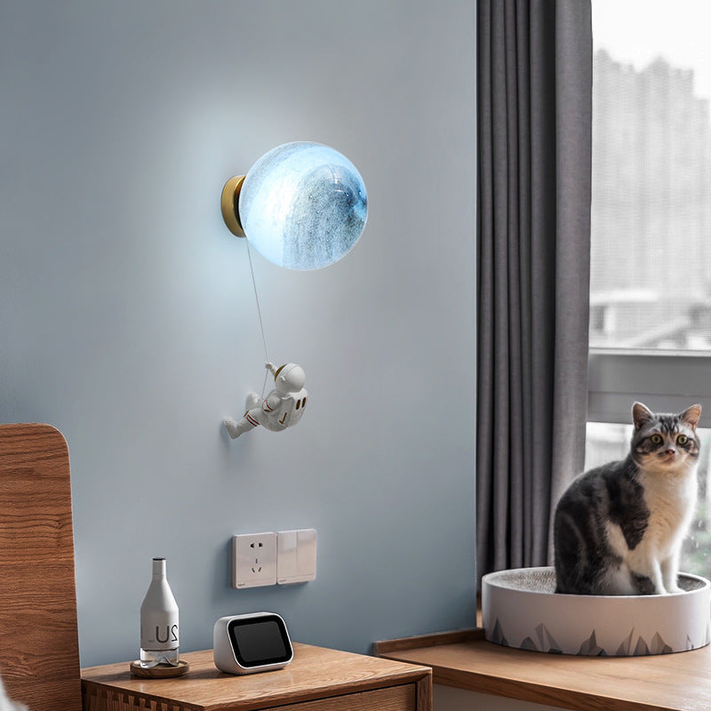 Lumendat Contemporary Nordic Kids Resin Glass Ball Astronaut Lunar Planet 1-Light Wall Sconce Lamp For Bedside Lumendat