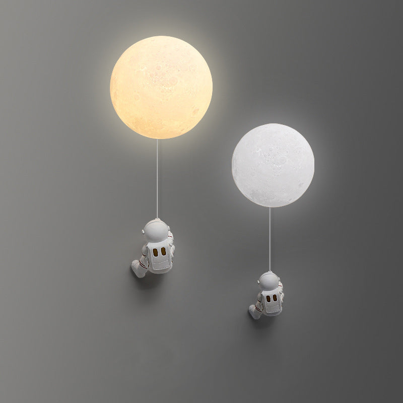 Lumendat Contemporary Nordic Kids Resin Glass Ball Astronaut Lunar Planet 1-Light Wall Sconce Lamp For Bedside Lumendat
