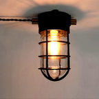Contemporary Industrial Waterproof Aluminum Alloy Glass Cylinder Cage 1-Light Semi-Flush Mount Ceiling Light For Outdoor Patio Lumendat