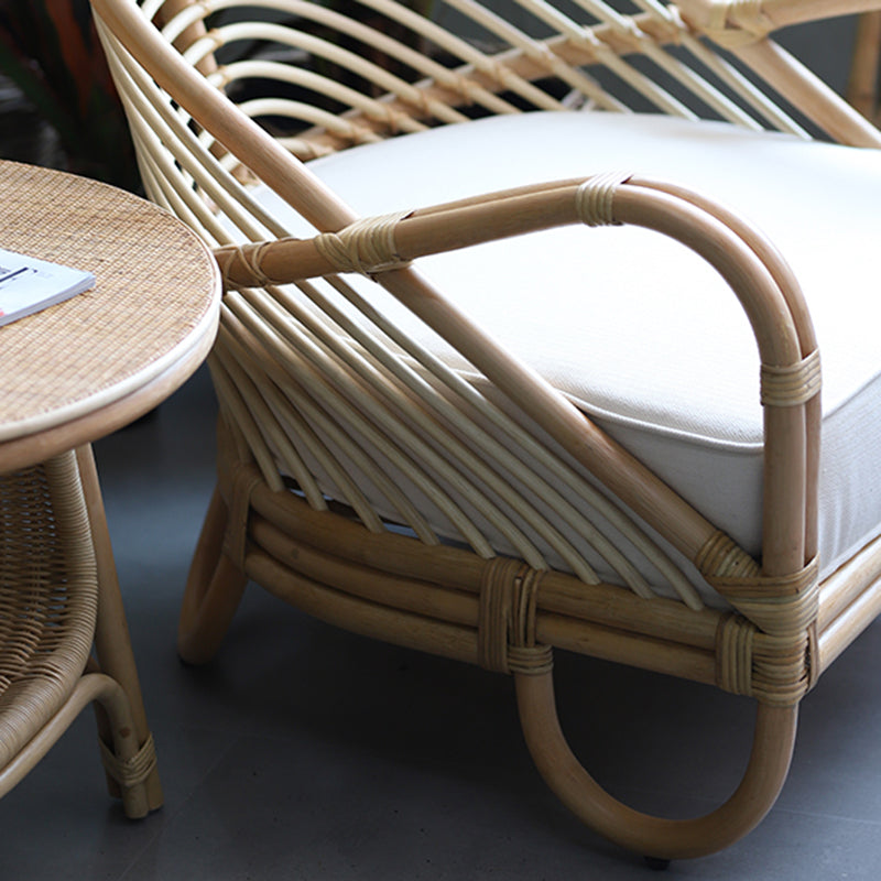Contemporary Boho Natural Rattan Accent Chair - Curved Handwoven Indonesian Rattan Armchair With Waterproof Fabric Cushion For Living Room Lumendat