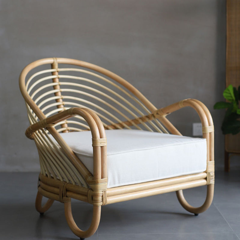 Contemporary Boho Natural Rattan Accent Chair - Curved Handwoven Indonesian Rattan Armchair With Waterproof Fabric Cushion For Living Room Lumendat
