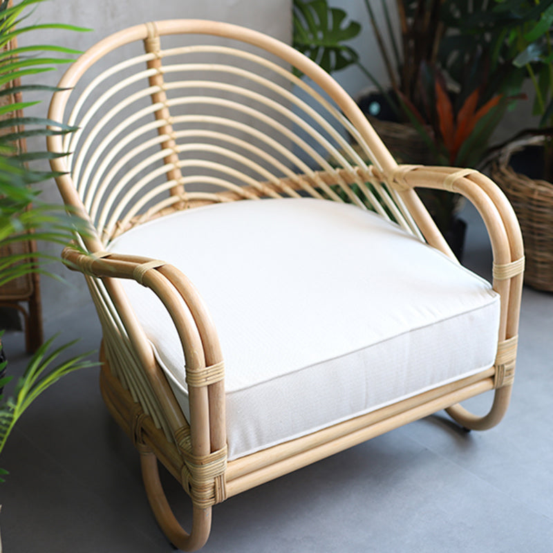 Contemporary Boho Natural Rattan Accent Chair - Curved Handwoven Indonesian Rattan Armchair With Waterproof Fabric Cushion For Living Room Lumendat