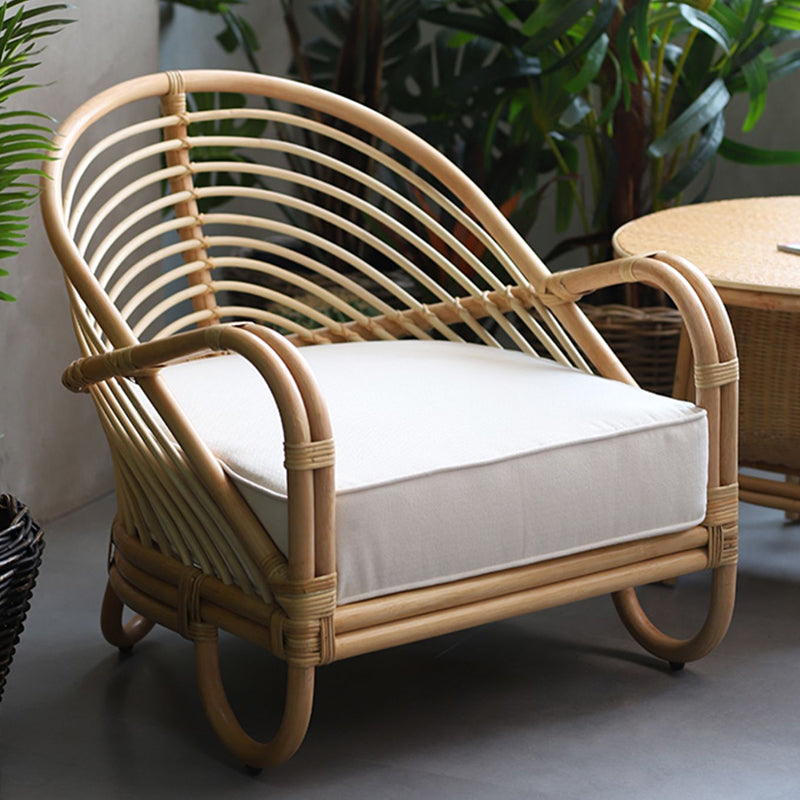 Contemporary Boho Natural Rattan Accent Chair - Curved Handwoven Indonesian Rattan Armchair With Waterproof Fabric Cushion For Living Room Lumendat
