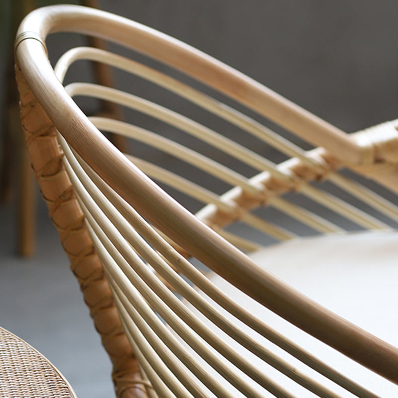 Contemporary Boho Natural Rattan Accent Chair - Curved Handwoven Indonesian Rattan Armchair With Waterproof Fabric Cushion For Living Room Lumendat